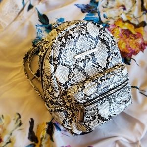 Steve Madden Black and White Snake Skin Backpack